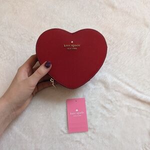 Kate Spade Outlets - heart clutch